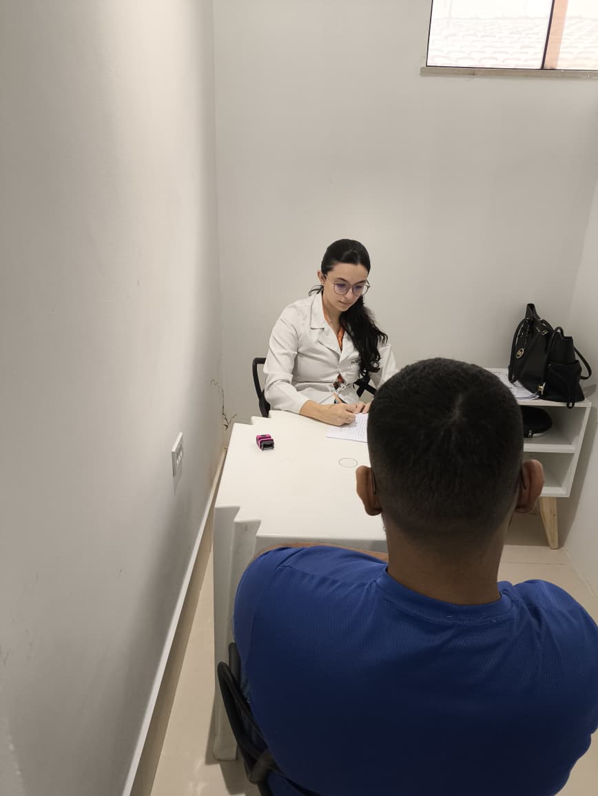 Consulta médica com a equipe voluntária